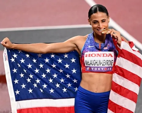 The American sprinter runs fastest women’s 400m in 40 years to claim gold medal